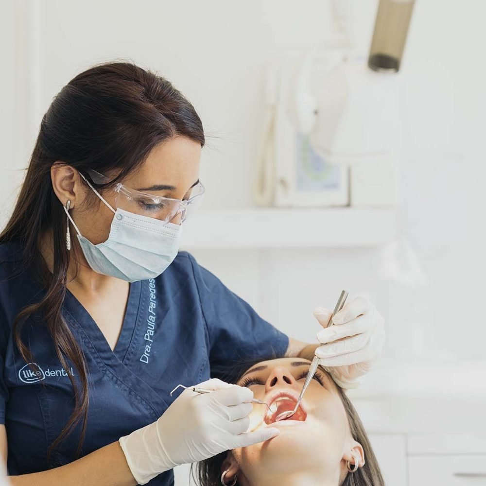 dentists-with-a-patient-during-a-dental-interventi-HUY7S4F.jpg